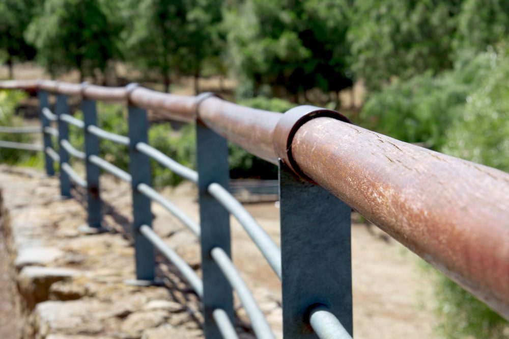 Containment fence outlet